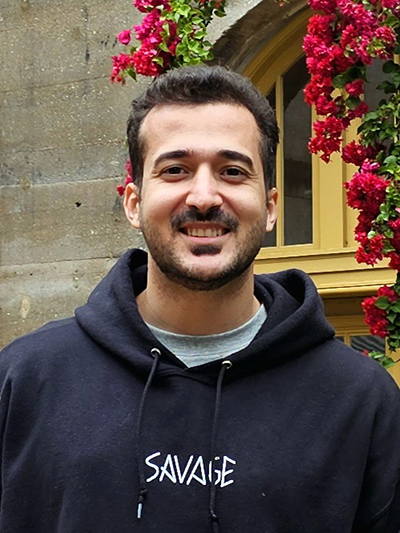 Headshot of Pouria.